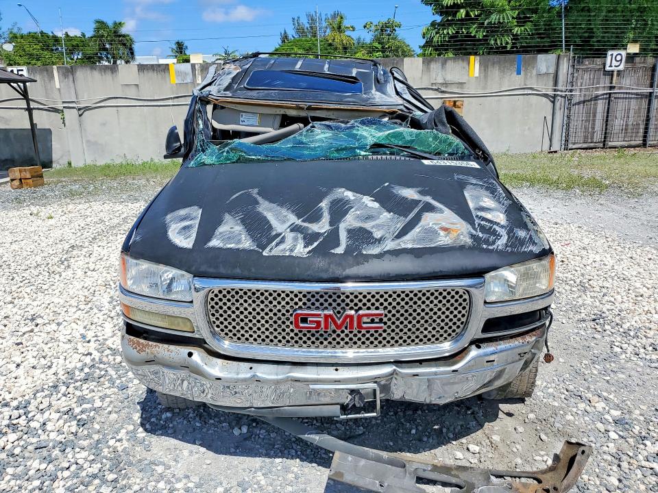 Photo 5 from auction – 2003 GMC YUKON with VIN 1GKEC13Z63R229204