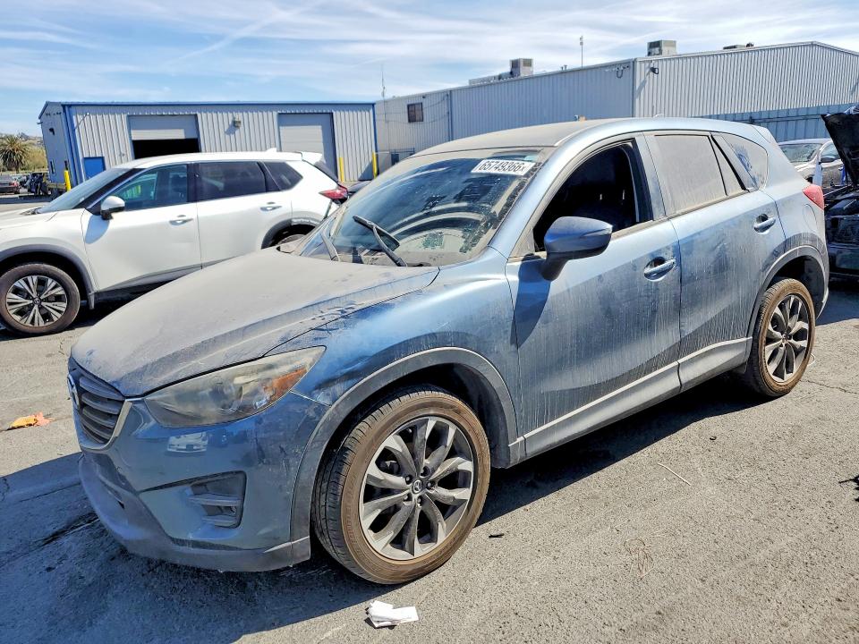 MAZDA CX-5 2016 with VIN JM3KE4DY7G0789251 - Photo from auction