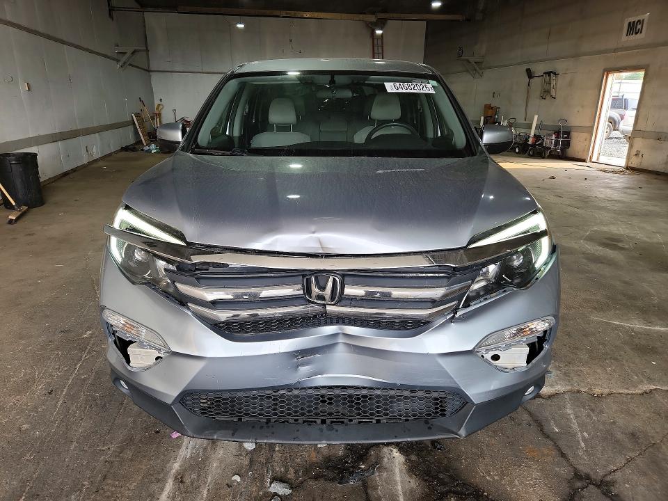 Photo 5 from auction – 2016 HONDA PILOT with VIN 5FNYF6H3XGB111962
