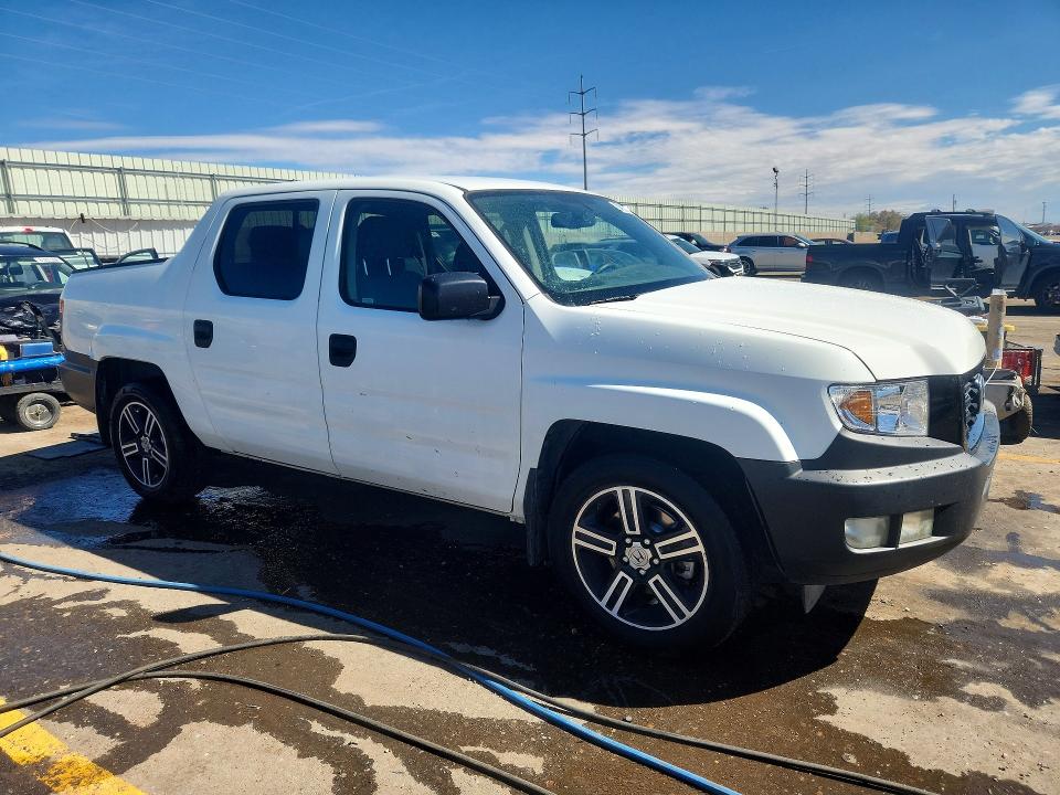 Photo 4 from auction – 2014 HONDA RIDGELINE with VIN 5FPYK1F73EB009427