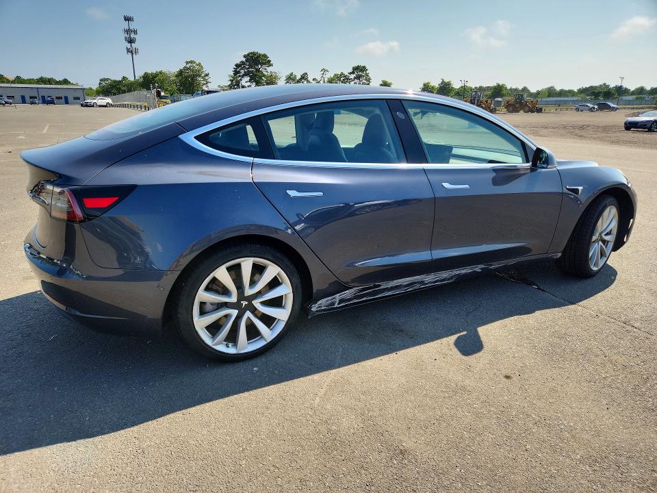 Photo 3 from auction – 2018 TESLA MODEL 3 with VIN 5YJ3E1EA3JF031087