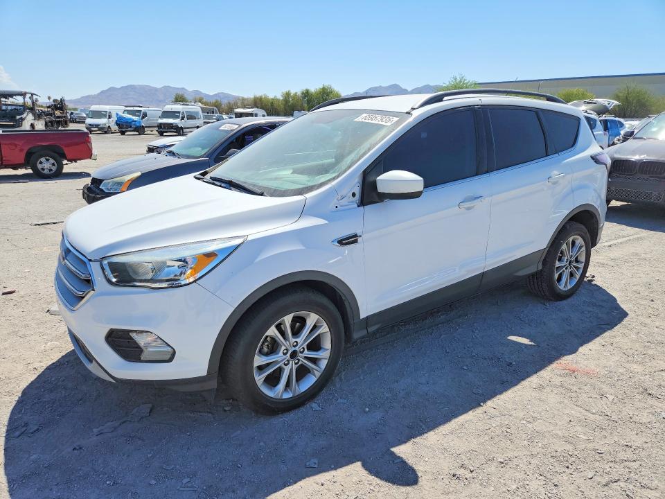 FORD ESCAPE 2018 with VIN 1FMCU0GD7JUA73754 - Photo from auction
