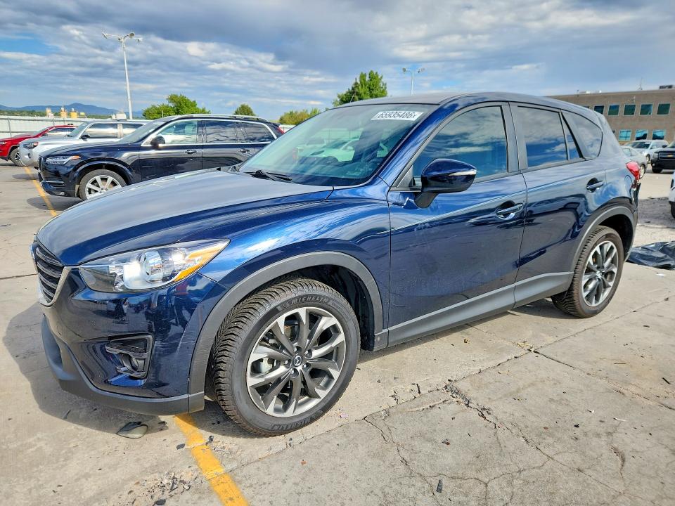 MAZDA CX-5 2016 with VIN JM3KE4DY6G0709776 - Photo from auction