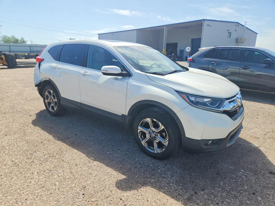Photo 4 from auction – 2017 HONDA CR-V with VIN 2HKRW2H55HH668893