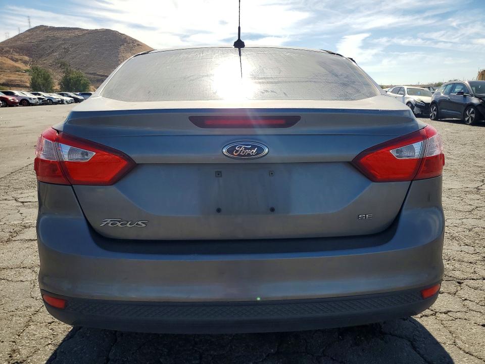 Снимка 6 от търг – 2013 FORD FOCUS с VIN 1FADP3F28DL200996