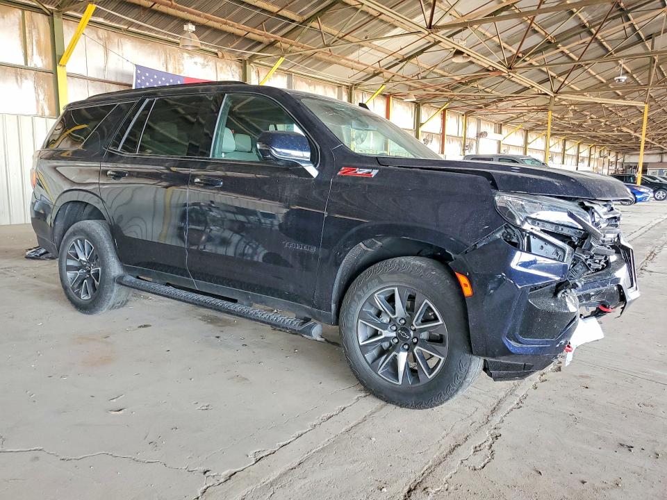 Photo 4 from auction – 2024 CHEVROLET TAHOE with VIN 1GNSKPKD2RR104713