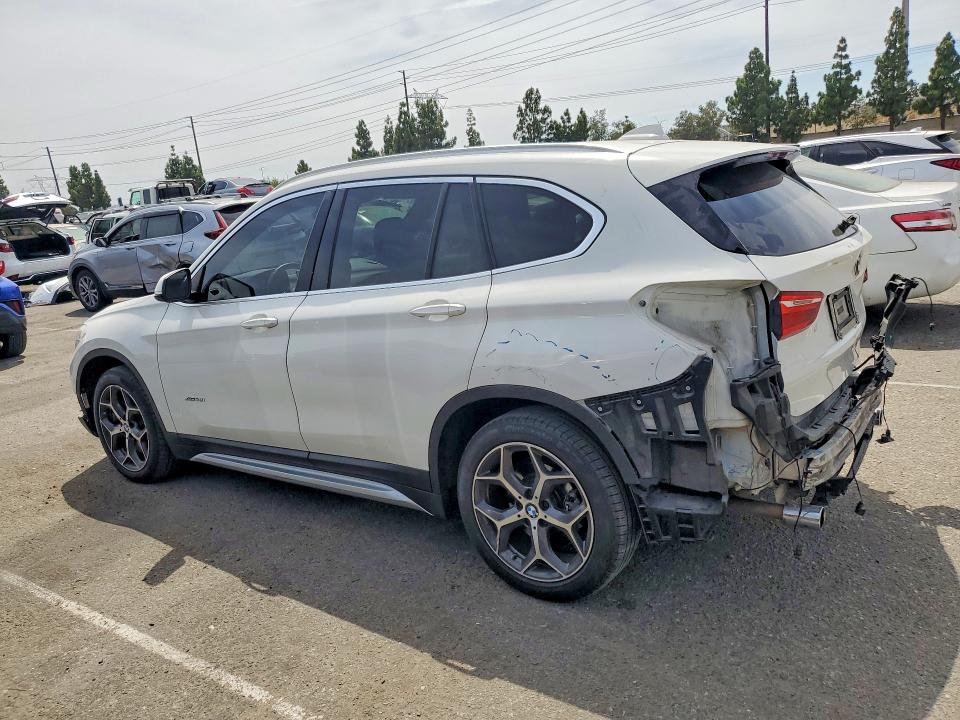 Photo 2 from auction – 2018 BMW X1 with VIN WBXHT3C38J5L26282
