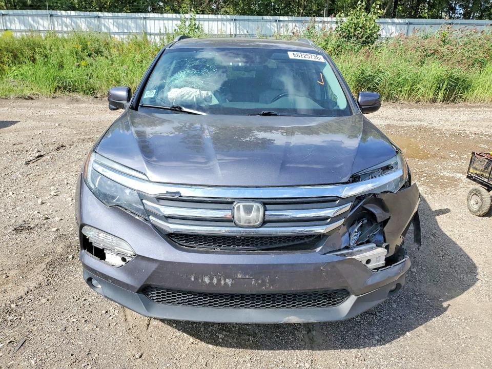 Photo 5 from auction – 2017 HONDA PILOT with VIN 5FNYF6H62HB104077