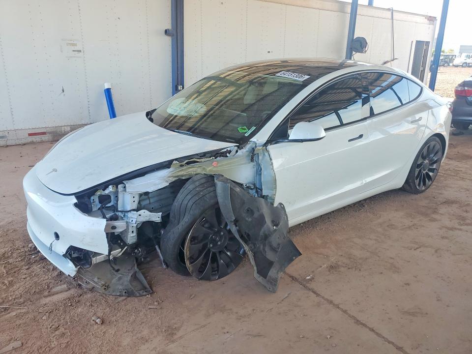 TESLA MODEL 3 2023 with VIN 5YJ3E1EC4PF497329 - Photo from auction