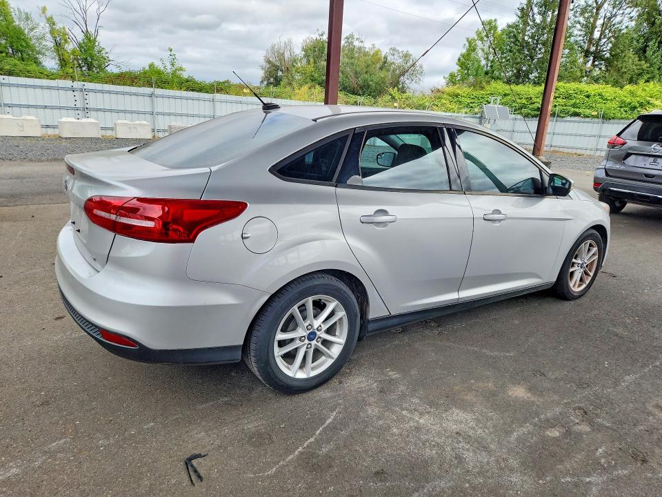 Photo 3 from auction – 2015 FORD FOCUS with VIN 1FADP3F23FL277018