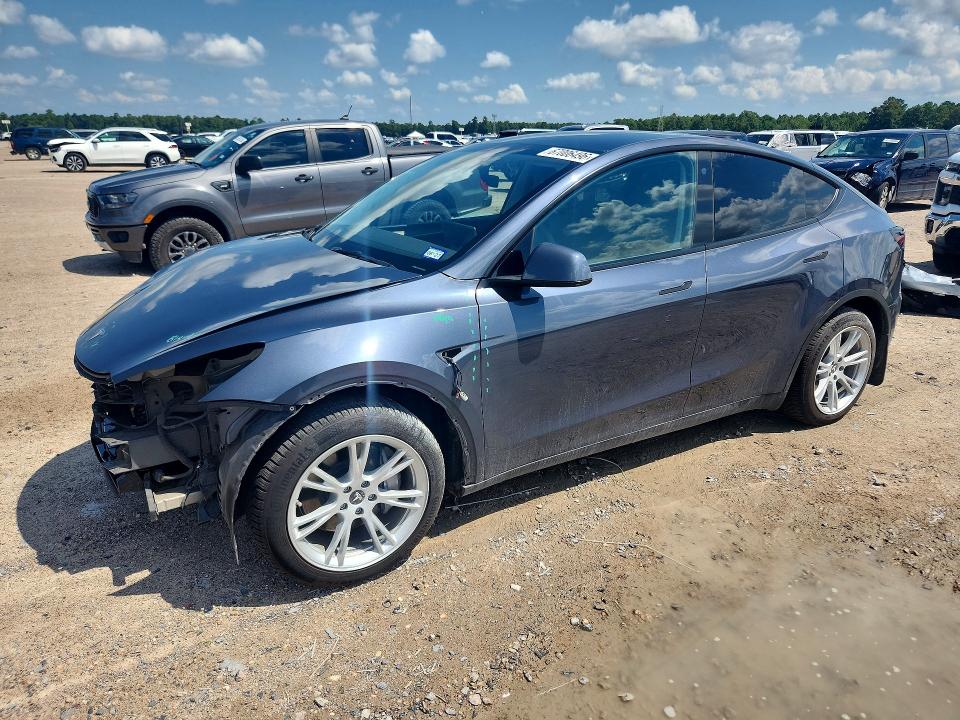 Снимка 1 от търг – 2023 TESLA MODEL Y с VIN 7SAYGDEE8PA119534