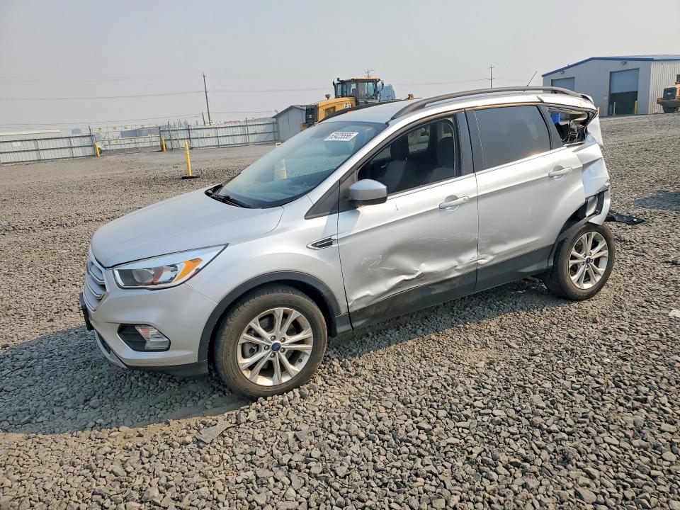 FORD ESCAPE 2018 with VIN 1FMCU9GD6JUC13491 - Photo from auction