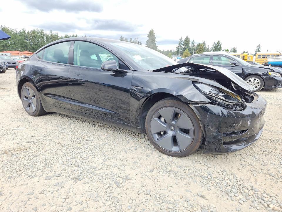 Photo 4 from auction – 2022 TESLA MODEL 3 with VIN 5YJ3E1EB0NF162587