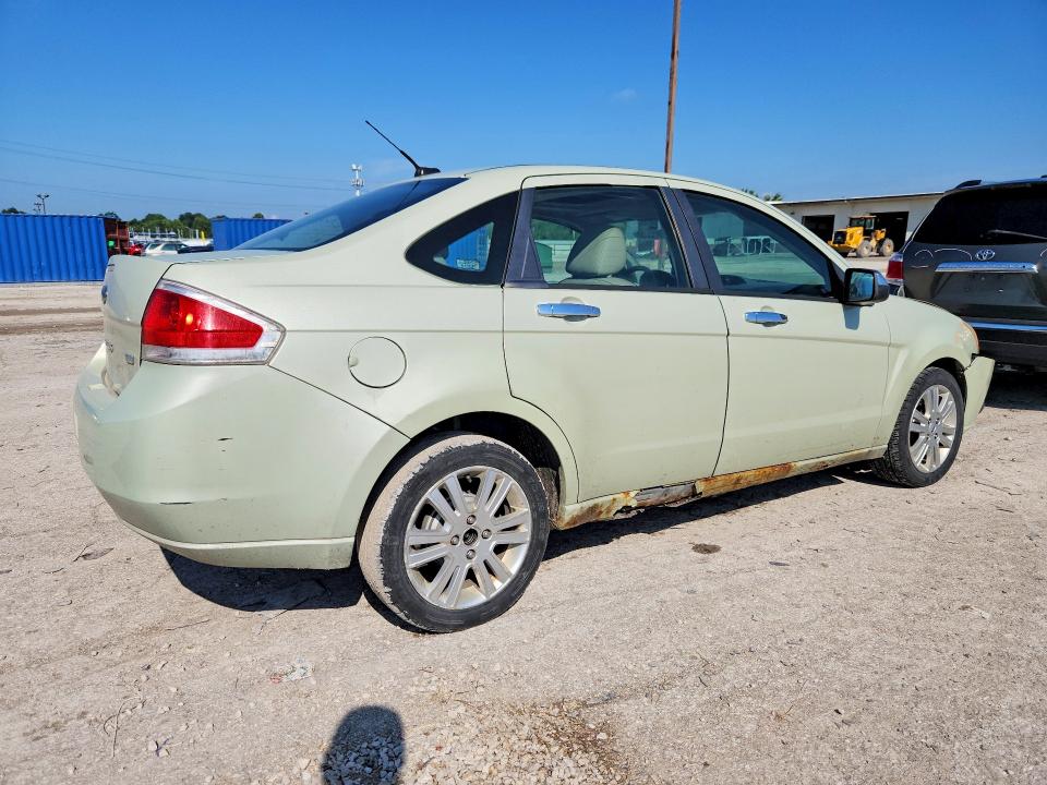 Photo 3 from auction – 2011 FORD FOCUS with VIN 1FAHP3HN2BW198618