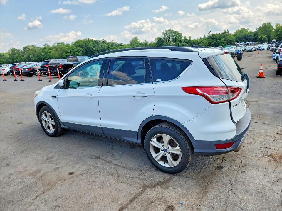 Photo 2 from auction – 2016 FORD ESCAPE with VIN 1FMCU9GX1GUB02110