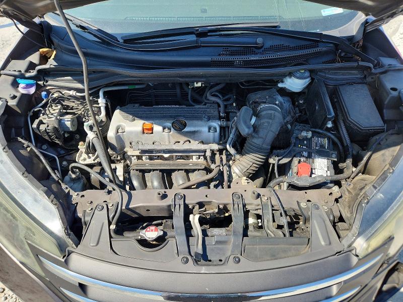 Photo 12 from auction – 2014 HONDA CR-V with VIN 2HKRM3H56EH520422