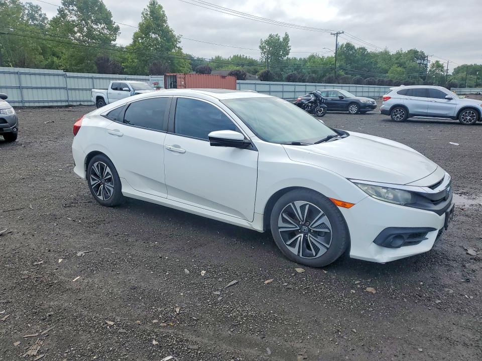 Photo 4 from auction – 2016 HONDA CIVIC with VIN 19XFC1F38GE200456