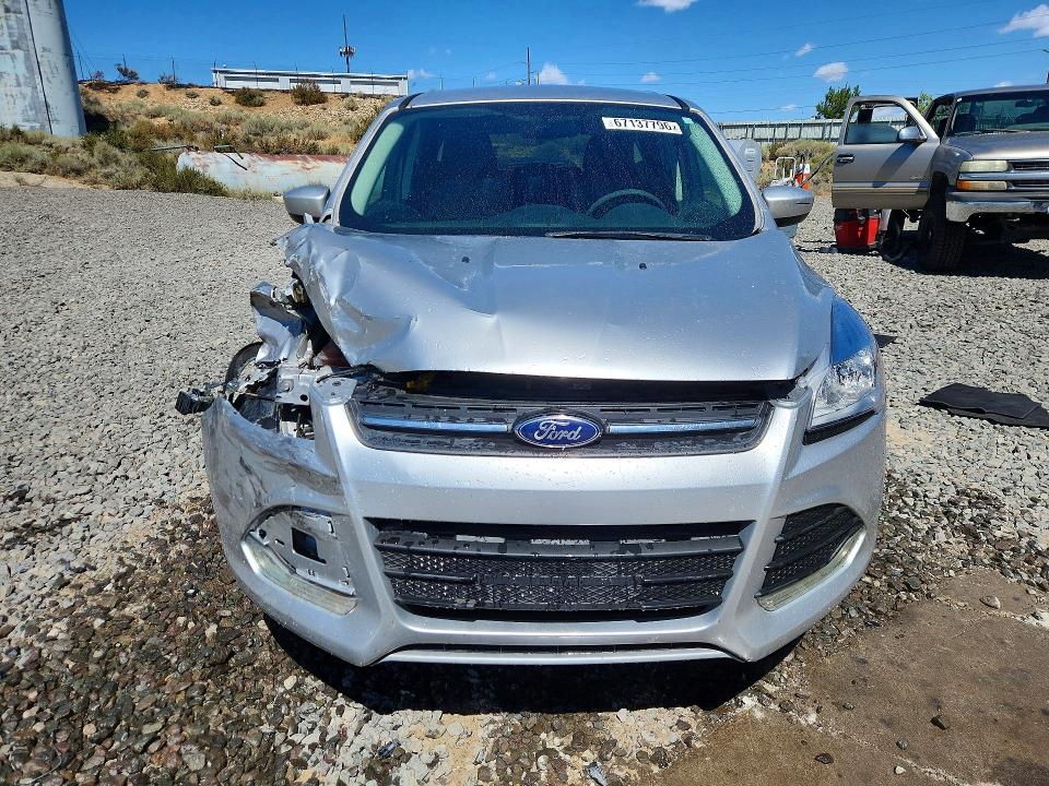 Photo 5 from auction – 2015 FORD ESCAPE with VIN 1FMCU9G95FUA09946