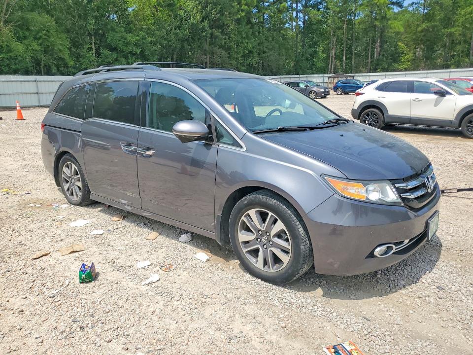 Photo 4 from auction – 2014 HONDA ODYSSEY with VIN 5FNRL5H90EB032826