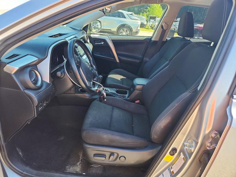Photo 7 from auction – 2018 TOYOTA RAV4 with VIN JTMRFREV8JJ229892