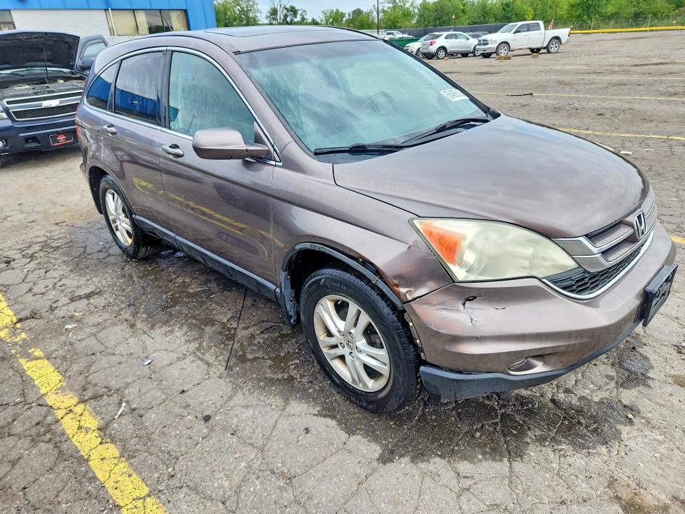 Photo 4 from auction – 2011 HONDA CR-V with VIN 5J6RE4H79BL018929