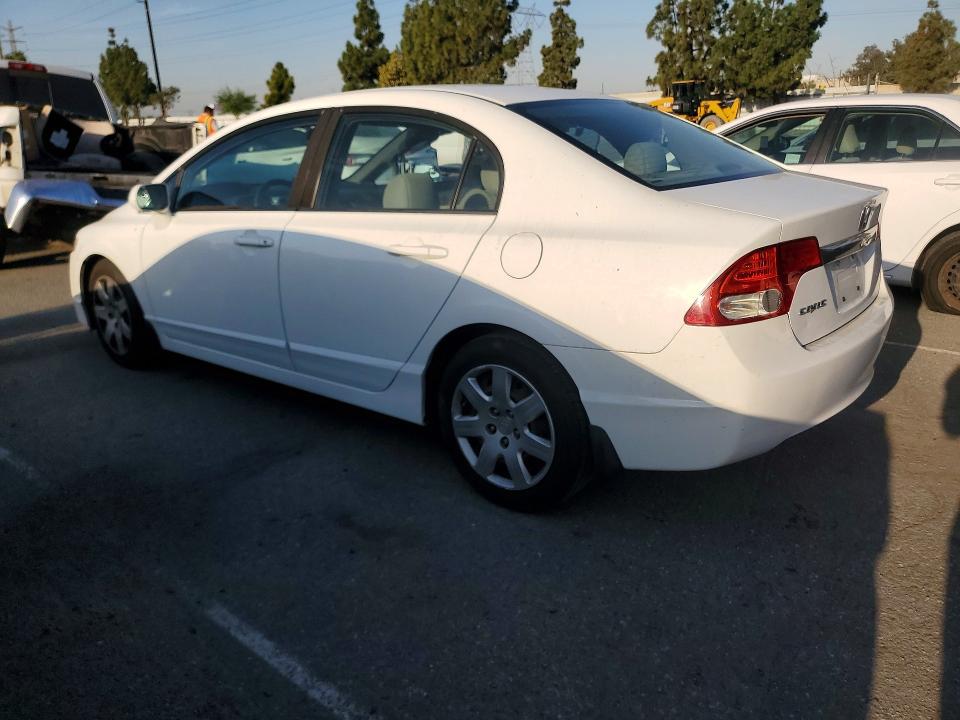 Photo 2 from auction – 2010 HONDA CIVIC with VIN 19XFA1F54AE079293