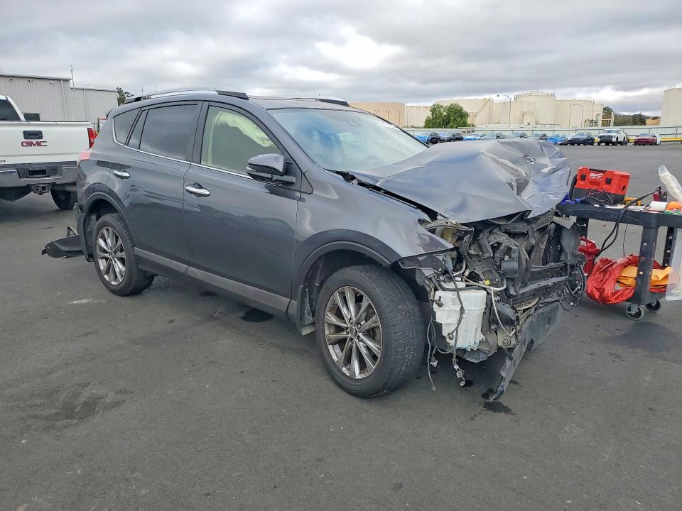 Photo 4 from auction – 2016 TOYOTA RAV4 with VIN JTMYFREV9GD084395