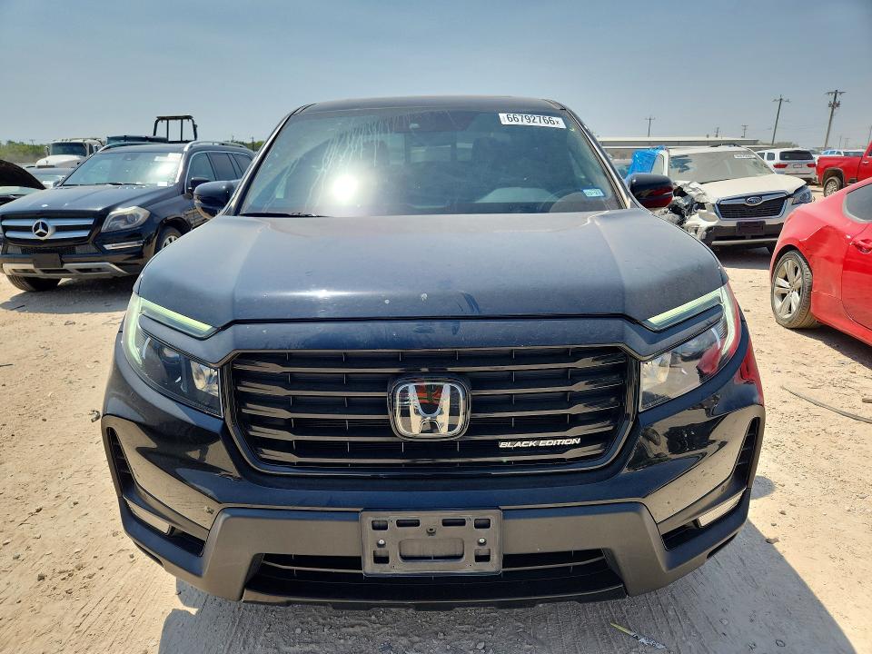 Photo 5 from auction – 2023 HONDA RIDGELINE with VIN 5FPYK3F82PB016280