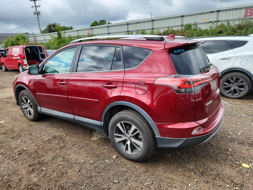 Photo 2 from auction – 2018 TOYOTA RAV4 with VIN 2T3RFREV2JW740743