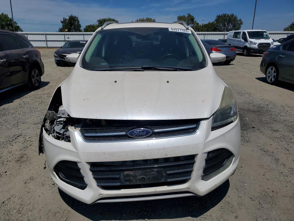 Photo 5 from auction – 2014 FORD ESCAPE with VIN 1FMCU0J95EUC30563