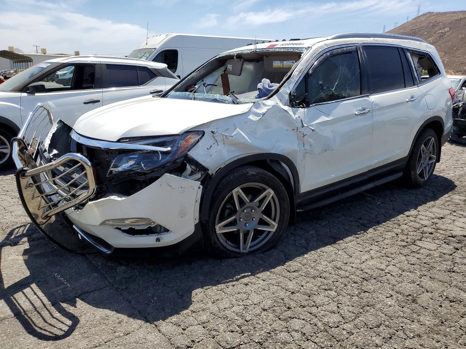 HONDA PILOT 2017 with VIN 5FNYF6H9XHB027971 - Photo from auction