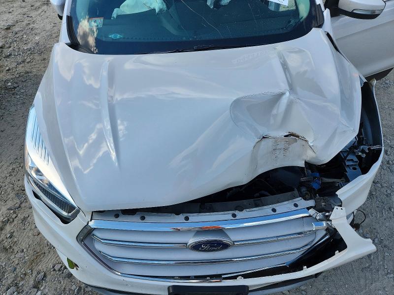 Photo 12 from auction – 2018 FORD ESCAPE with VIN 1FMCU9J91JUA45912