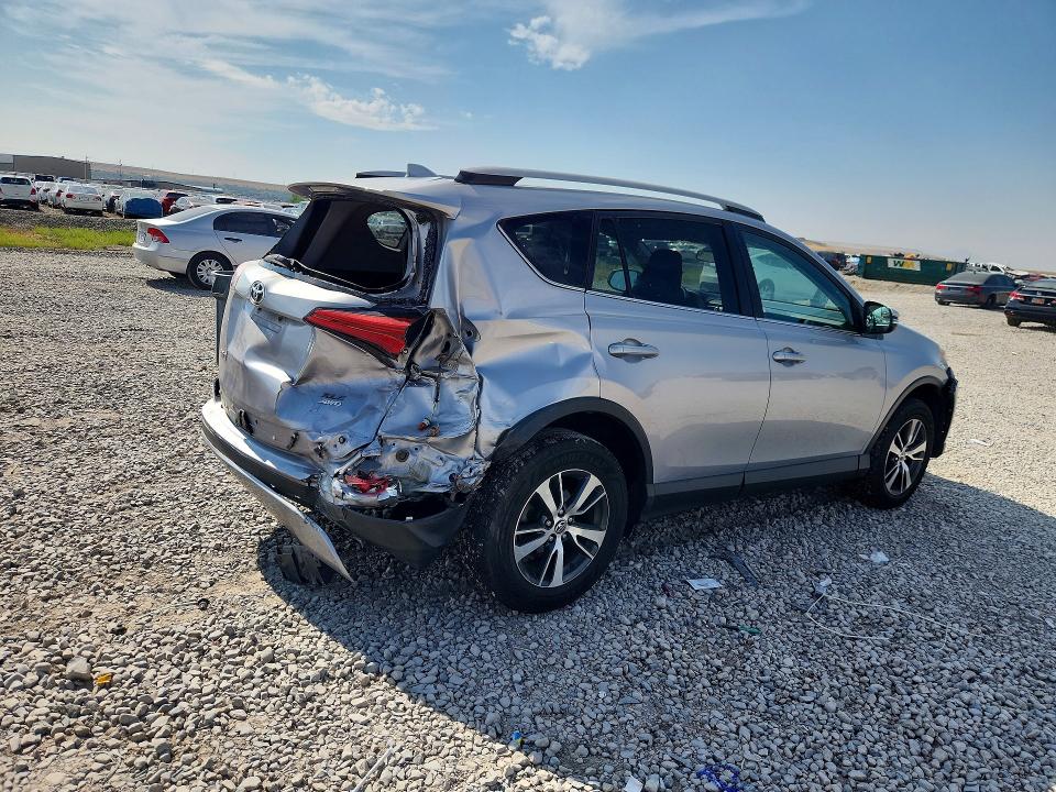 Photo 3 from auction – 2018 TOYOTA RAV4 with VIN 2T3RFREV1JW748879