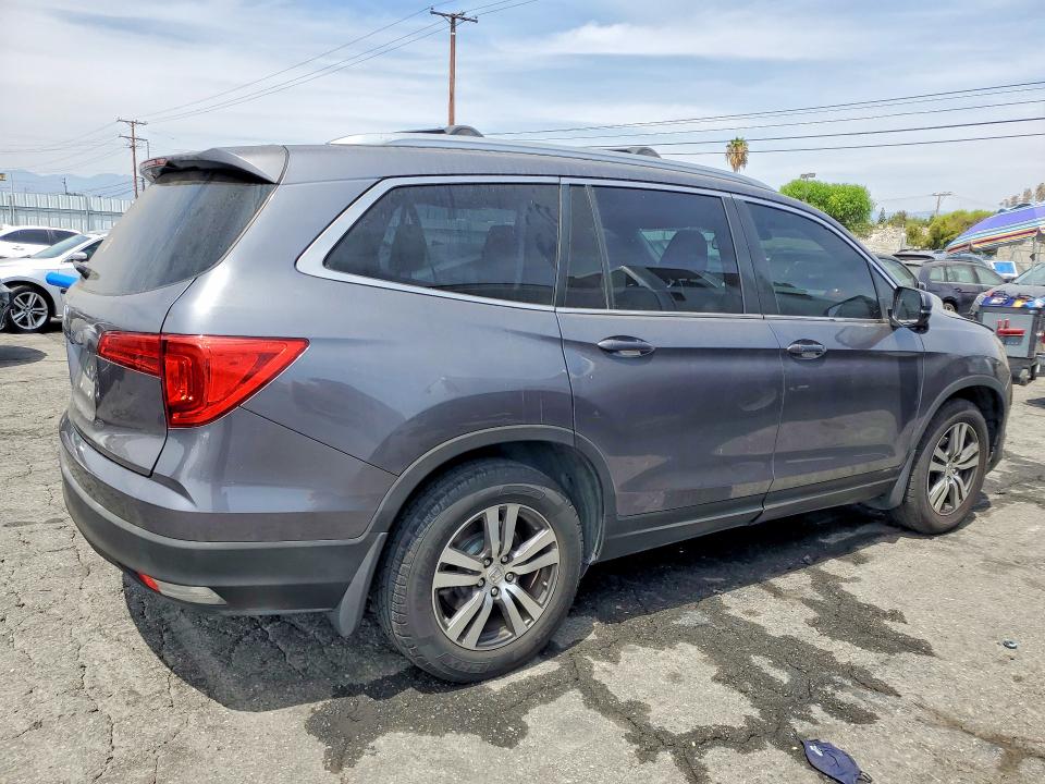 Photo 3 from auction – 2016 HONDA PILOT with VIN 5FNYF5H65GB011479