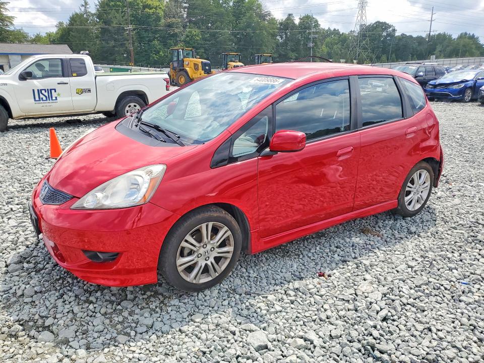 HONDA FIT 2010 with VIN JHMGE8H49AC040730 - Photo from auction