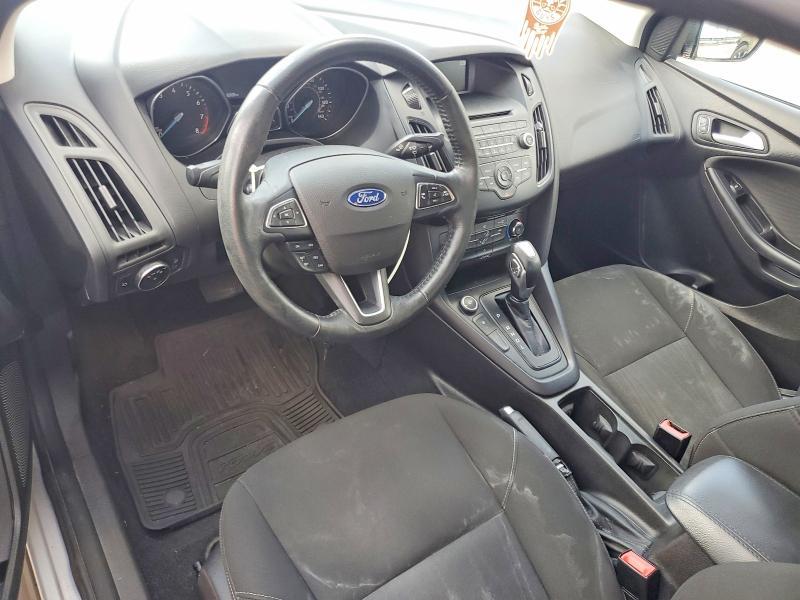 Photo 8 from auction – 2015 FORD FOCUS with VIN 1FADP3F23FL280498