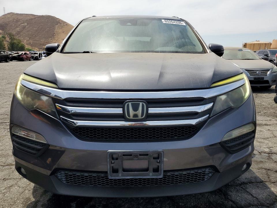 Photo 5 from auction – 2016 HONDA PILOT with VIN 5FNYF5H65GB011479