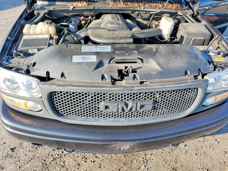 Photo 12 from auction – 2004 GMC YUKON with VIN 1GKEK63U04J291279