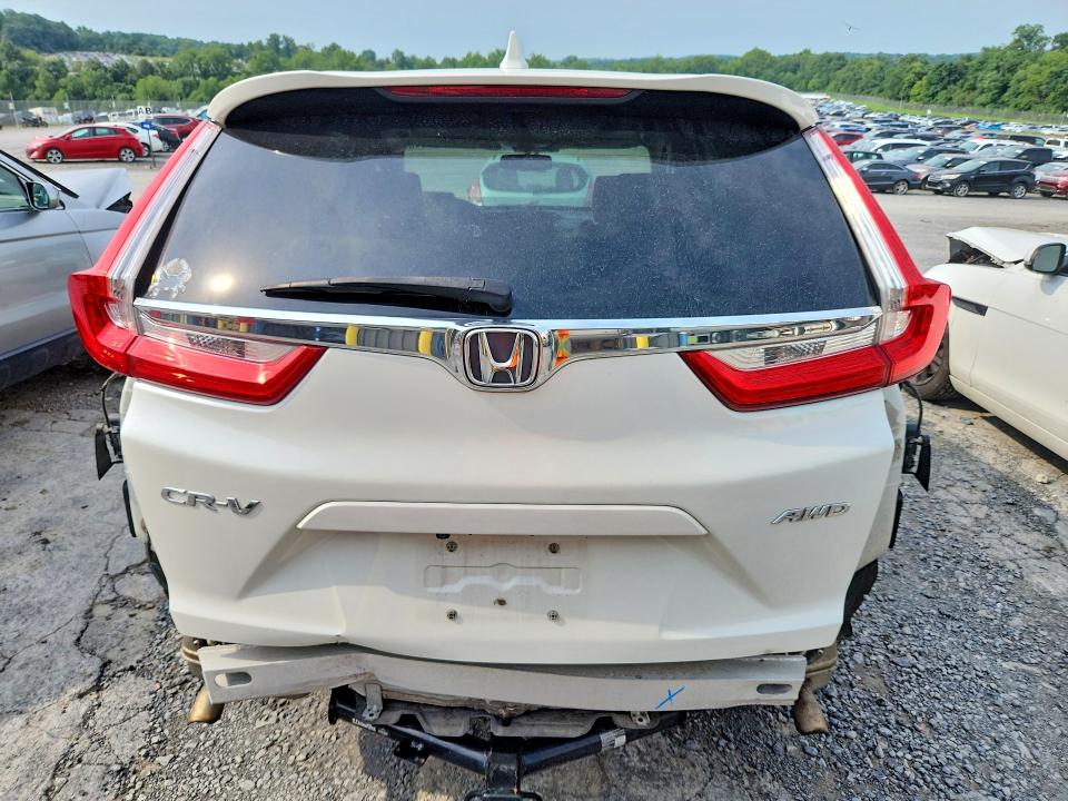 Photo 6 from auction – 2017 HONDA CR-V with VIN 2HKRW2H83HH611084