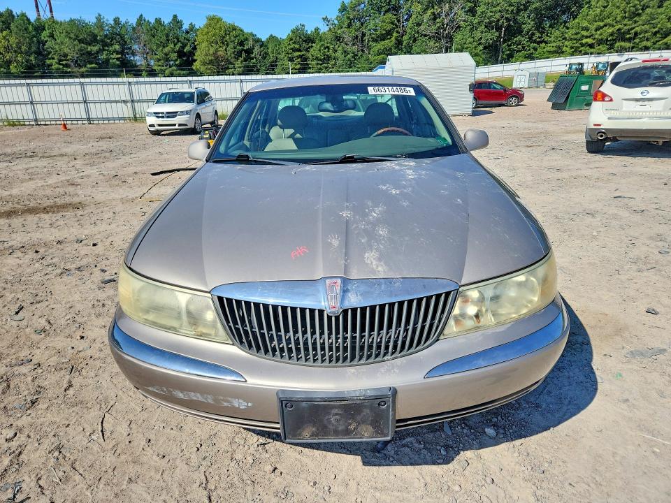 Photo 5 from auction – 2002 LINCOLN CONTINENTAL with VIN 1LNHM97V52Y700089