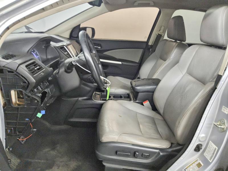 Photo 7 from auction – 2015 HONDA CR-V with VIN 2HKRM3H71FH521545