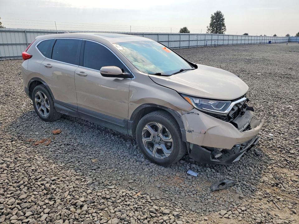 Photo 4 from auction – 2017 HONDA CR-V with VIN 5J6RW2H56HL068678