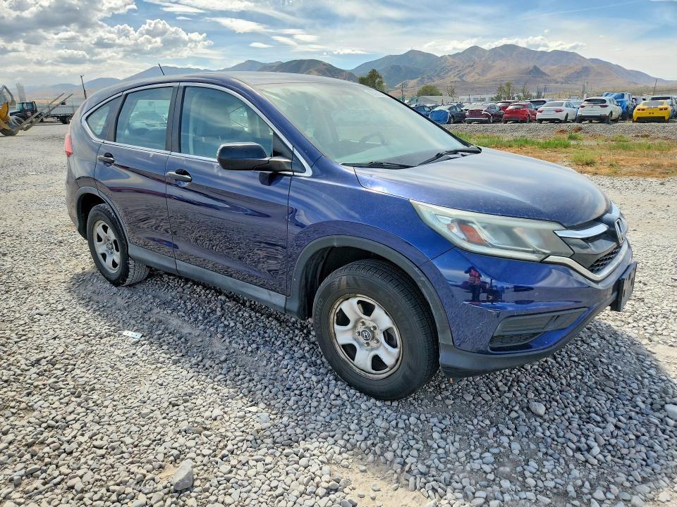 Photo 4 from auction – 2015 HONDA CR-V with VIN 3CZRM3H30FG713457