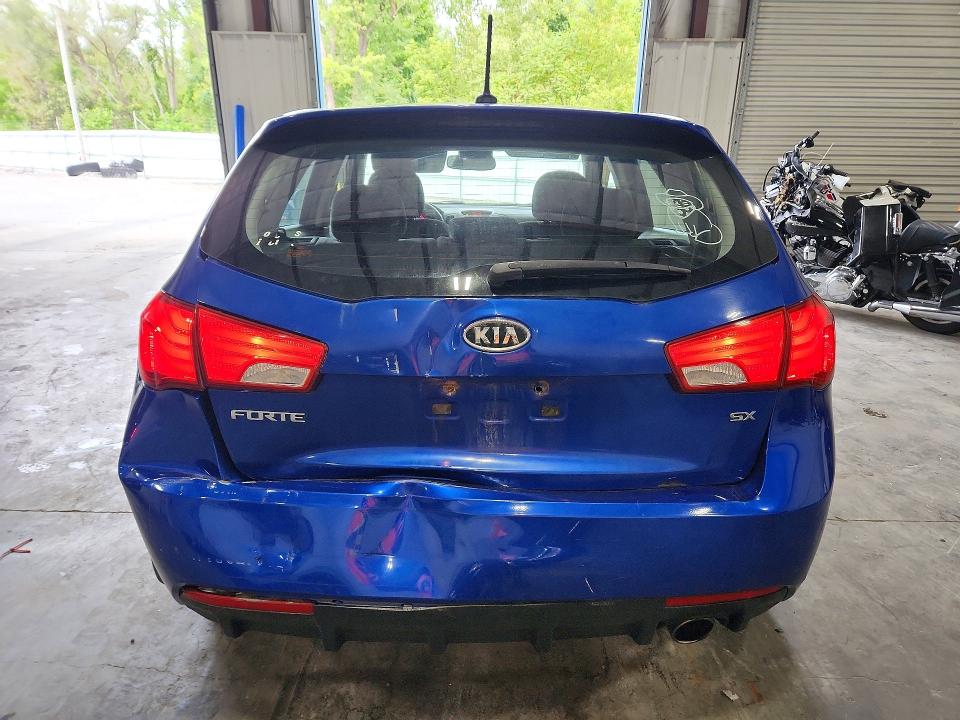 Photo 6 from auction – 2013 KIA FORTE5 with VIN KNAFW5A39D5667265