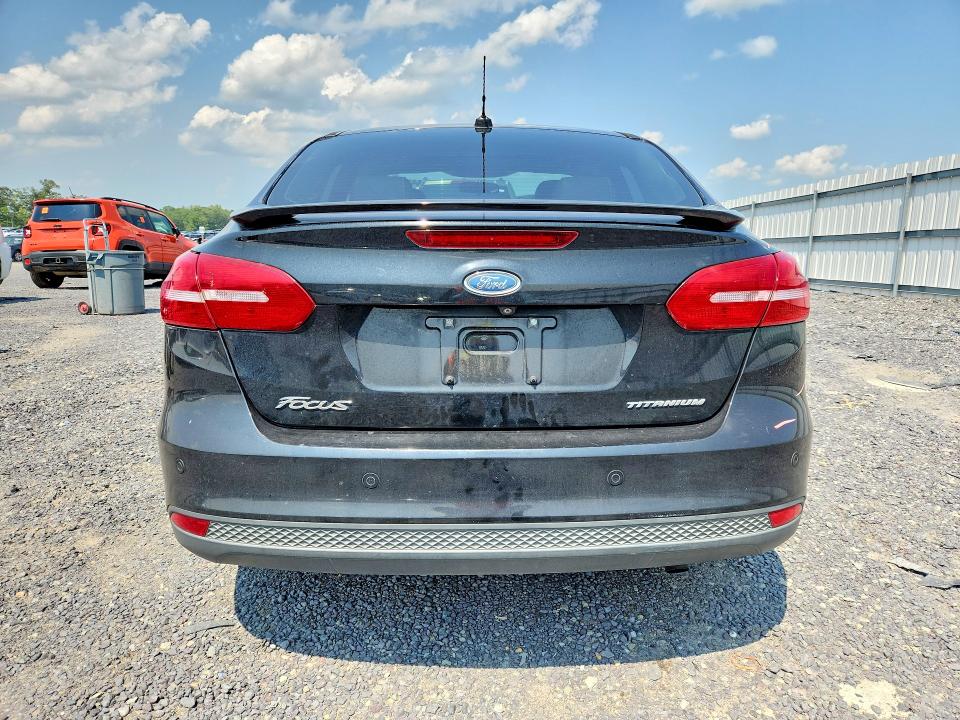 Photo 6 from auction – 2015 FORD FOCUS with VIN 1FADP3J24FL232838