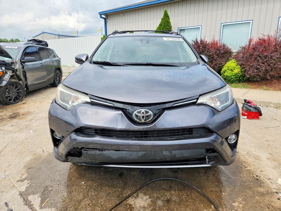 Photo 5 from auction – 2018 TOYOTA RAV4 with VIN JTMWFREV1JJ201516