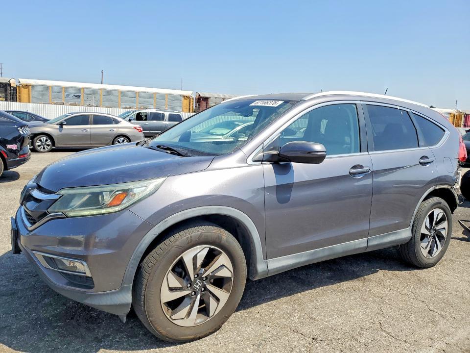 Photo 1 from auction – 2015 HONDA CR-V with VIN 5J6RM3H95FL017748