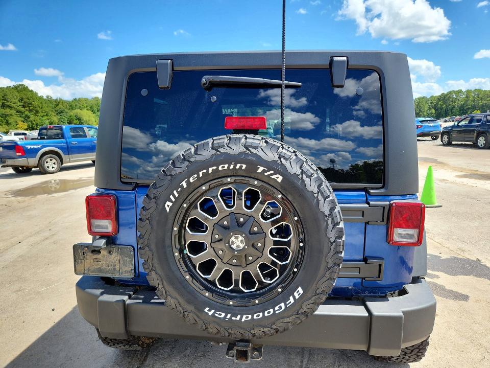 Photo 6 from auction – 2009 JEEP WRANGLER with VIN 1J4FA24199L762772