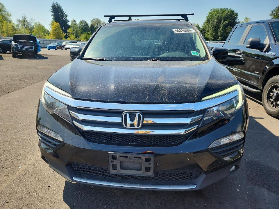 Photo 5 from auction – 2016 HONDA PILOT with VIN 5FNYF6H84GB104159