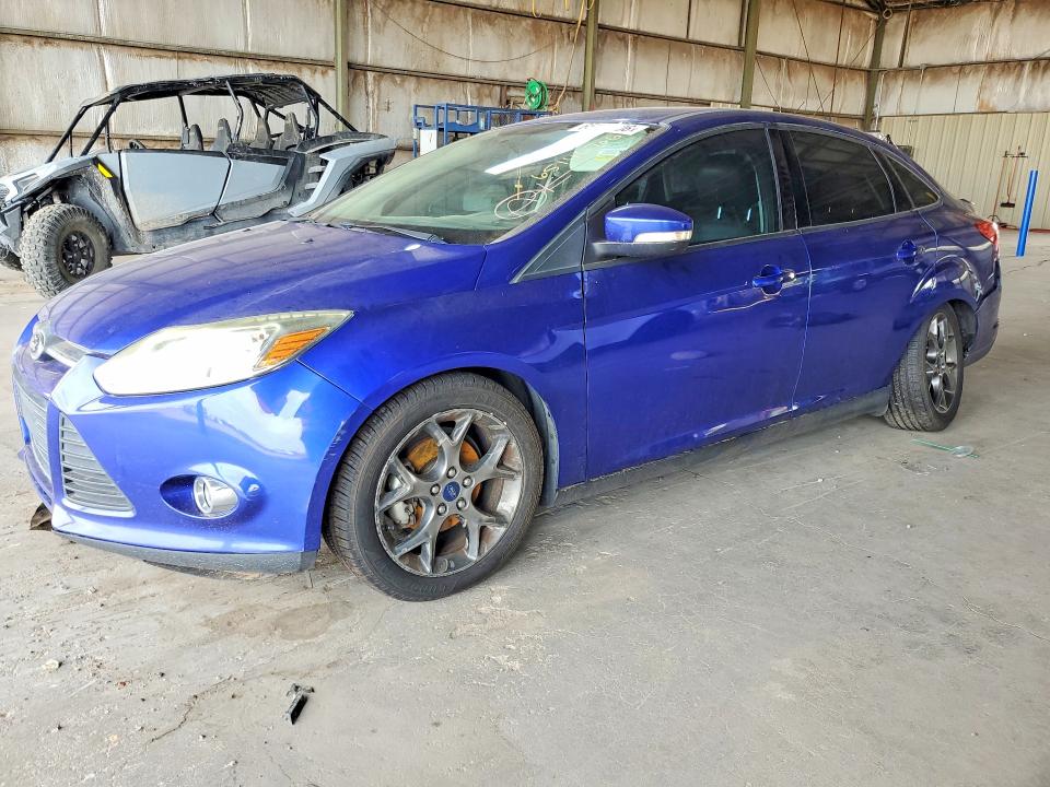 FORD FOCUS 2014 with VIN 1FADP3F2XEL327427 - Photo from auction